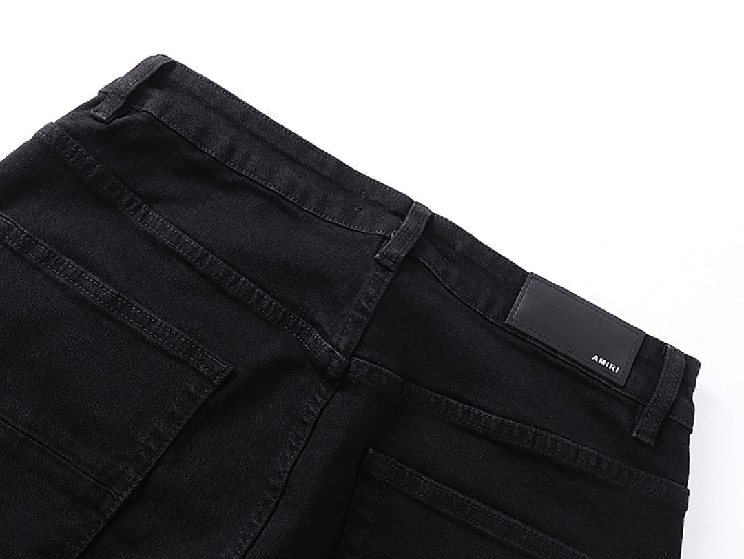 Amiri rhinestone-embellished black jeans
