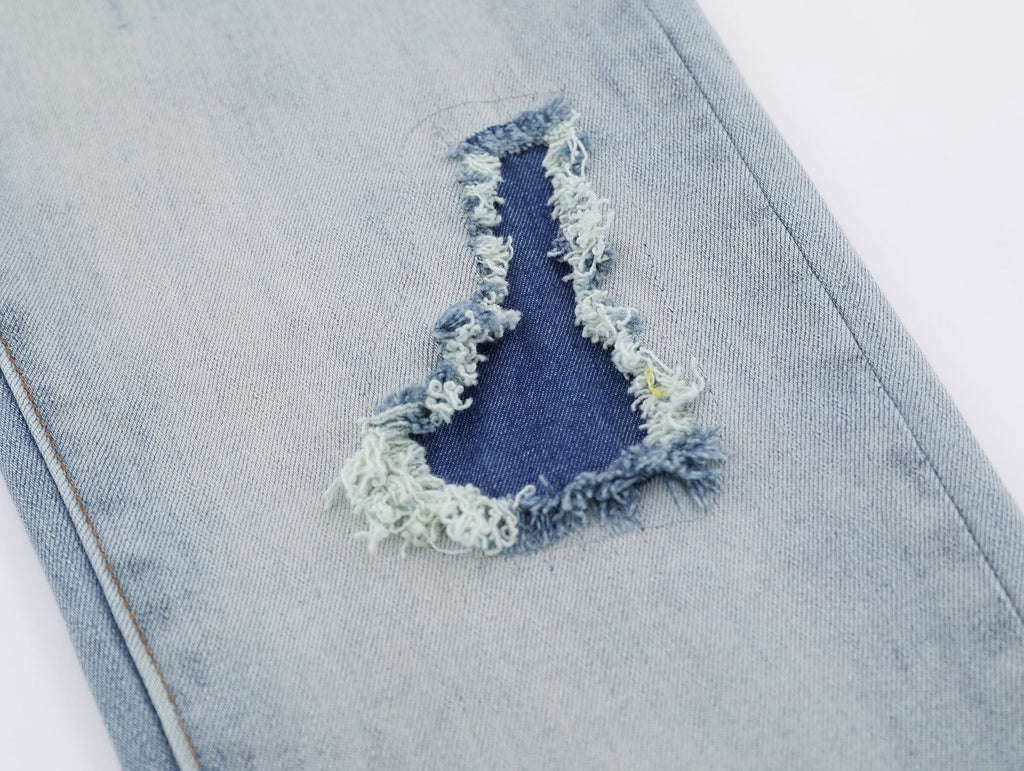 P130 Ripped Light Blue Jeans