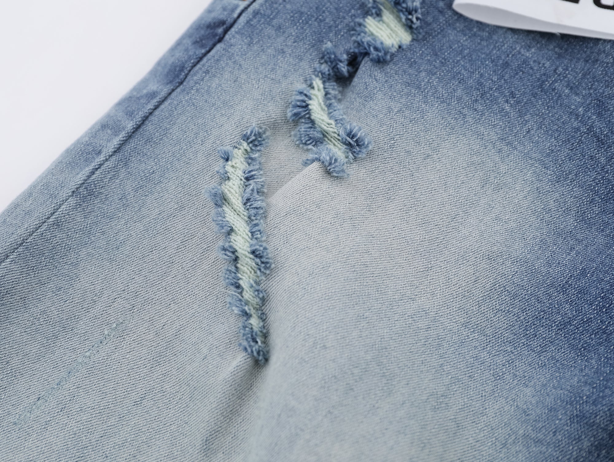 P130 Ripped Light Blue Jeans